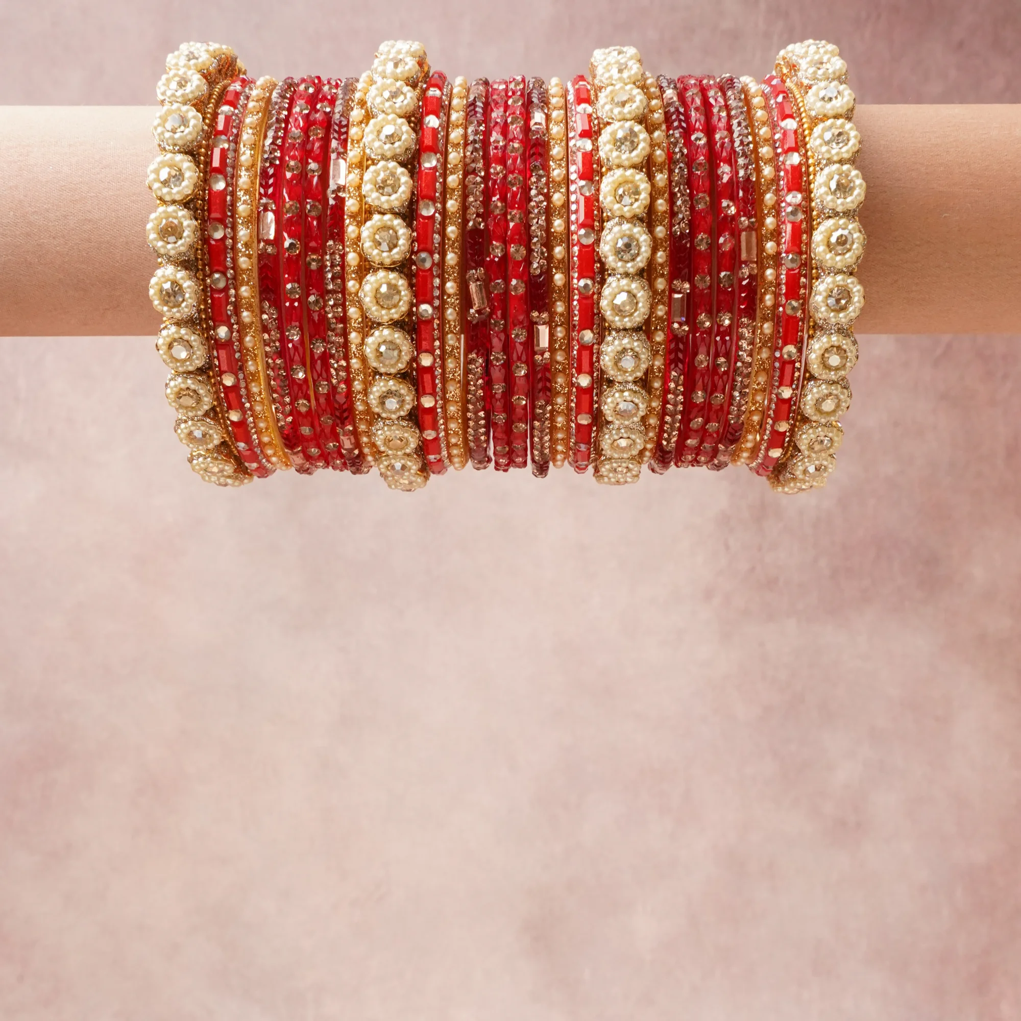 A grounding Red forms the heart of the set, while touches of Cream, Gold add charm.

A thoughtful composition of Gold-toned Metal, Glass, Imitation Pearls, Rhinestones, designed to feel complete without being heavy.
Each element layers seamlessly, creating a look that is refined, wearable and quietly striking.